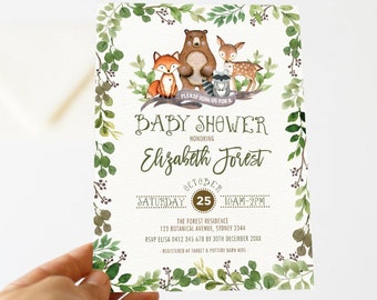 May include: A baby shower invitation with a woodland theme. The invitation features a watercolor illustration of a fox, bear, deer, and raccoon surrounded by green leaves. The text on the invitation reads "Please join us for a baby shower honoring Elizabeth Forest, Saturday, October 25, 10AM-2PM, The Forest Residence, 123 Botanical Avenue, Sydney 2344, RSVP Elisa 0412 345 678 by 30th December 20XX, Registered at Target & Pottery Barn Kids, Blue Bunny Paper."