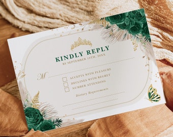 Puede incluir: Una tarjeta RSVP blanca con un borde dorado y un diseño floral verde. La tarjeta tiene una sección para que los invitados indiquen si aceptan o rechazan la invitación, así como un espacio para los requisitos dietéticos. El texto de la tarjeta dice "Kindly Reply by September 10th, 20XX".
