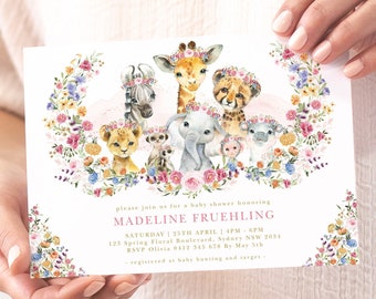 May include: A baby shower invitation with a pink and white floral wreath featuring a giraffe, zebra, lion, elephant, and monkey wearing flower crowns. The text reads "Please join us for a baby shower honoring Madeline Fruehling. Saturday 25th April, 4pm-6pm. 125 Spring Floral Boulevard, Sydney NSW 2034. RSVP Olivia 0412 345 678 By May 5th. Registered at Baby Bunting and Target."