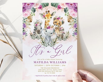 Peut inclure: Une invitation de fête prénatale "C'est une fille" avec une couronne florale rose et violette et des illustrations à l'aquarelle d'une girafe, d'un zèbre, d'un éléphant, d'une guépard et d'un singe. Le texte indique "C'est une fille" et "rejoignez-nous pour une fête prénatale en l'honneur de Matilda Williams".