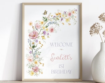May include: A printable welcome sign with a floral wreath design in shades of pink, yellow, and blue. The sign says "Welcome to Scarlett's 1st Birthday".