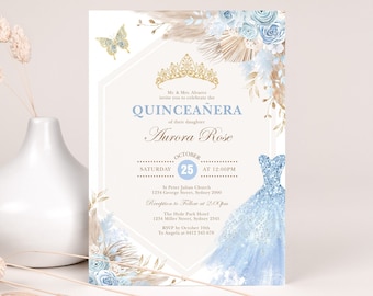 May include: A blue and gold quinceañera invitation with a watercolour design featuring a crown, flowers, and a butterfly. The text reads "Quinceañera" and "Aurora Rose". The date is 25th October, and the time is 12:00 PM. The invitation also includes the location of the ceremony and reception.