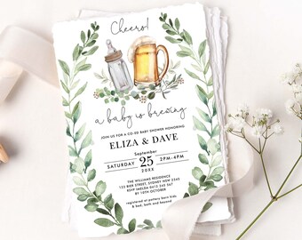 May include: A baby shower invitation with a green leafy border. The invitation features a baby bottle and a beer mug with the text "a baby is brewing". The invitation is for Eliza & Dave on September 25th, 20XX from 2 PM to 4 PM at The Williams Residence. RSVP by October 10th.