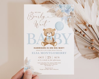 May include: A baby shower invitation with a watercolor design. The invitation features a teddy bear, a blue balloon, and the words "We Can Bearly Wait BABY." The invitation is for Harrison and Elsa Montgomery.