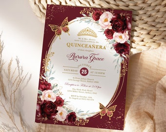 May include: Burgundy and gold quinceañera invitation with a floral design and butterflies. The invitation includes the name Aurora Grace, the date October 25th, and the time 12:00 PM. The invitation also includes the location of the ceremony and reception.