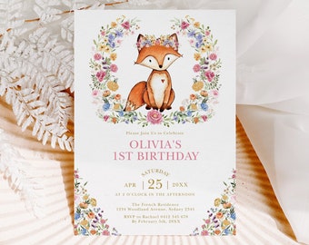 May include: A white invitation card with a floral wreath surrounding a cartoon fox wearing a flower crown. The text on the card reads "Please Join Us to Celebrate Olivia's 1st Birthday, Saturday, Apr 25, 20XX, at 1 o'clock in the afternoon, The French Residence, 1234 Woodland Avenue, Sydney 2345, RSVP to Rachael 0412 345 678, By February 5th, 20XX".