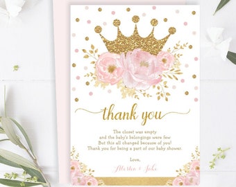 May include: Pink and gold thank you card with a gold glitter crown and pink flowers. The text reads "thank you" and "The closet was empty and the baby's belongings were few. But this all changed because of you! Thank you for being a part of our baby shower. Love, Alesha & Jake".