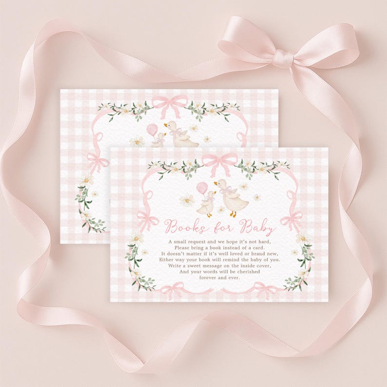 May include: Two baby shower invitations with a pink gingham pattern and floral accents. The cards feature illustrations of ducks with balloons and the text "Books for Baby". A pink ribbon with a bow is draped across the image.