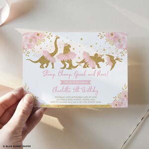 May include: A birthday invitation with a pink and gold theme. It features glittery dinosaur illustrations wearing tutus and crowns. The text reads "Stomp, Chomp, Growl and Roar!" and "Join us to celebrate Charlotte's 5th Birthday."