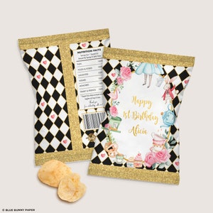 May include: A chip bag party favour with a black and white chequered pattern and gold glitter. The front of the bag features a watercolour illustration of Alice in Wonderland characters, including Alice, the Mad Hatter, the White Rabbit, and a flamingo. The text "Happy 1st Birthday Alicia" is written in gold lettering.