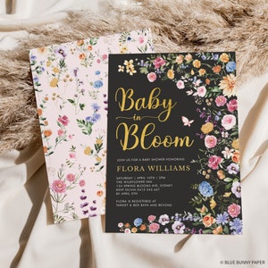 May include: A black baby shower invitation with gold lettering that reads "Baby in Bloom" and floral illustrations. The invitation includes the name Flora Williams, the date and time of the shower, the location, and RSVP information. The text "Flora is registered at Target & Bed Bath and Beyond" is also included.