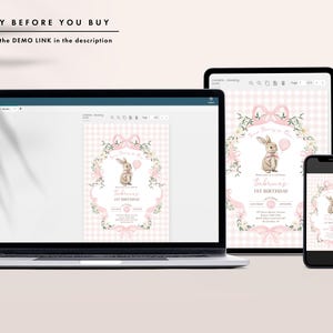Op de afbeelding: Een laptop, tablet en smartphone tonen een roze en wit bloemenontwerp met een konijnenillustratie, ideaal voor een eerste verjaardag. De tekst "TRY BEFORE YOU BUY" en "Find the DEMO LINK in the description" zijn zichtbaar.