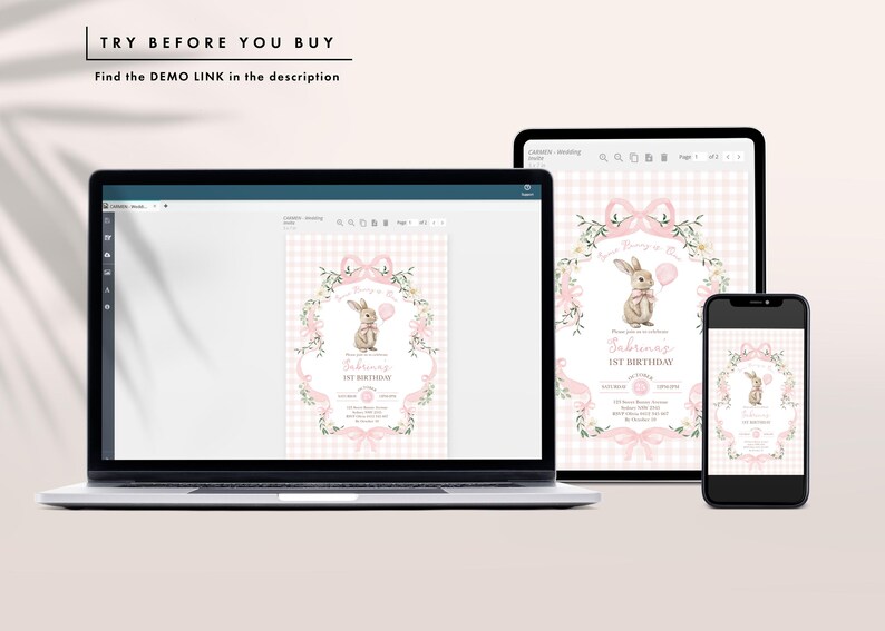Op de afbeelding: Een laptop, tablet en smartphone tonen een roze en wit bloemenontwerp met een konijnenillustratie, ideaal voor een eerste verjaardag. De tekst "TRY BEFORE YOU BUY" en "Find the DEMO LINK in the description" zijn zichtbaar.