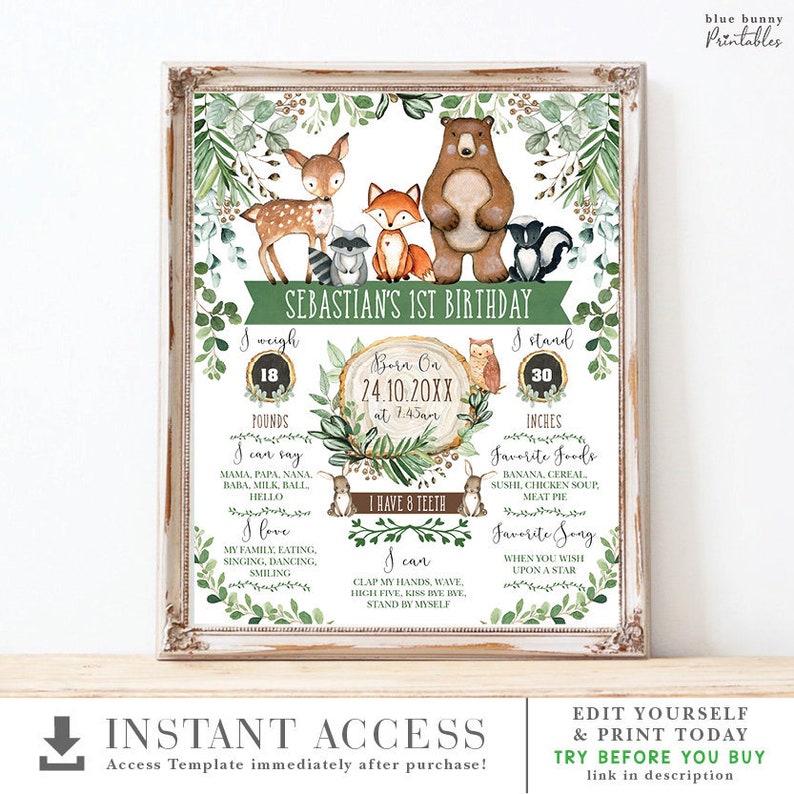 May include: A printable woodland-themed first birthday milestone poster with a green background and illustrations of a deer, fox, raccoon, bear, and owl. The poster includes the child's name, Sebastian, and details about their first year, including their weight, height, favorite foods, and songs. The poster is framed in a brown wooden frame.