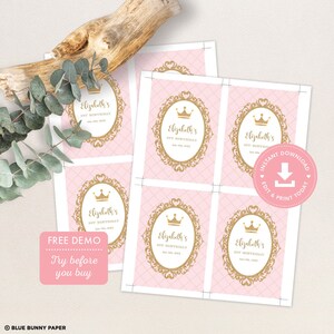 K&ouml;nnte beinhalten: Druckbare rosa und goldene Geschenkanh&auml;nger mit einer goldenen Krone und einem verzierten Rahmen. Der Text lautet "Elizabeth's 1st Birthday".