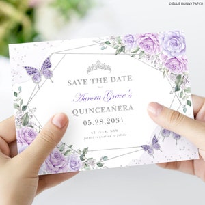 May include: Save the date card with a silver geometric frame and purple flowers. The text reads "Save the Date for Aurora Grace's Quincea&ntilde;era 05.28.2031 ST IVES, NSW formal invitation to follow".