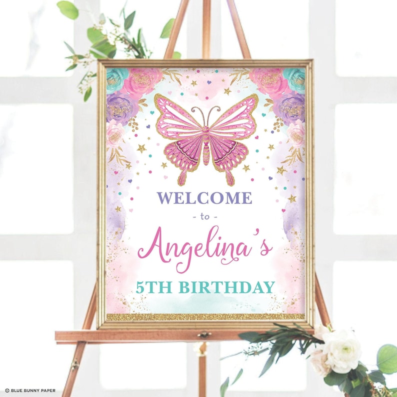 May include: Welcome to Angelina's 5th Birthday sign with a pink butterfly, gold glitter, and watercolor flowers on a light pink background.