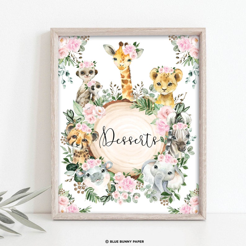 May include: A printable sign featuring a watercolour illustration of a wooden slice surrounded by pink flowers, greenery, and various jungle animals wearing flower crowns. The text "Desserts" is written in cursive on the wooden slice.