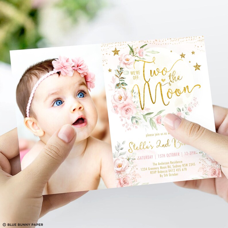 May include: A pink and gold birthday invitation with a photo of a baby girl. The invitation says "Two the Moon" and includes details for Stella's 2nd birthday party.