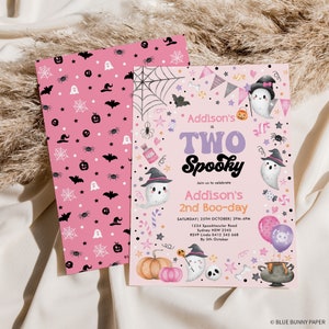 May include: Pink and purple Halloween party invitation with a ghost wearing a witch's hat and holding a candy cane. The text reads "Addison's is Two Spooky" and "Join us to celebrate Addison's 2nd Boo-day".