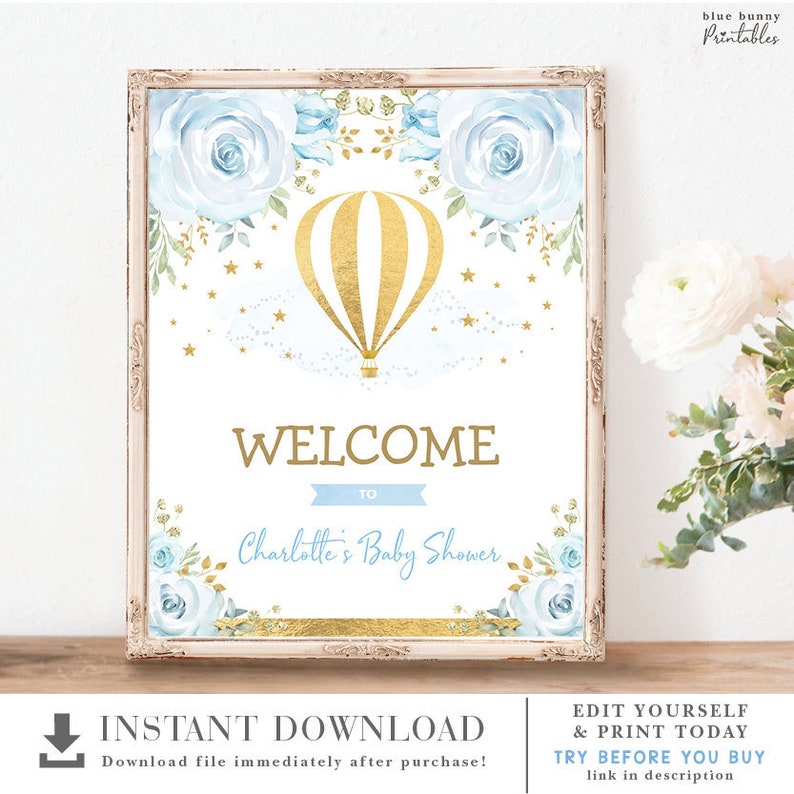 May include: Printable welcome sign for a baby shower featuring a gold hot air balloon, blue flowers, and gold stars. The text reads "Welcome to Charlotte's Baby Shower".