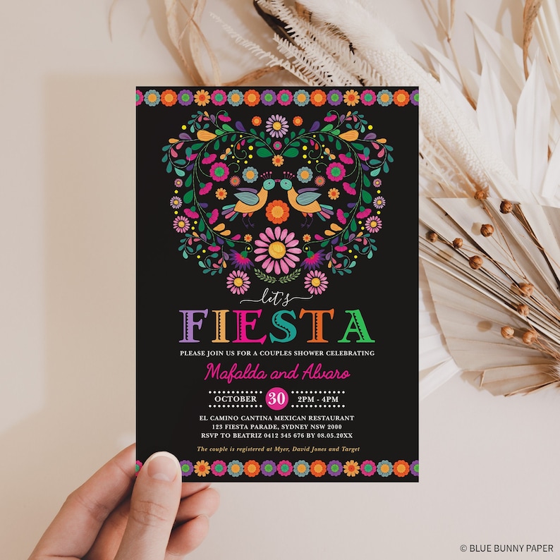 May include: A black invitation with a colorful floral design and two birds. The text reads "Let's Fiesta" and "Please join us for a couples shower celebrating Mafalda and Alvaro". The date is October 30th, 2pm-4pm. The location is El Camino Cantina Mexican Restaurant, 123 Fiesta Parade, Sydney NSW 2000. RSVP to Beatriz 0412 345 676 by 08.05.20XX. The couple is registered at Myer, David Jones and Target.