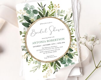 May include: A white bridal shower invitation card with deckled edges, featuring a central gold-rimmed circle surrounded by watercolor green eucalyptus leaves and foliage. The text reads: please join us for a Bridal Shower honoring bride to be ANTONIA ROBERTSON SATURDAY | OCTOBER 15TH | 12PM-3PM The Robertson Residence 123 Botanical Greenery Ave, Sydney 2345 RSVP to Rachael 0412 345 678 By 5th October 20XX Registered at Target & Pottery Barn.
