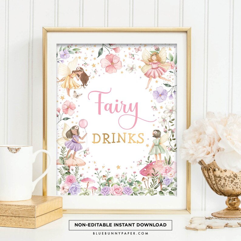 May include: A framed print with a gold border featuring the words "Fairy Drinks" in pink and gold. The print is decorated with watercolor illustrations of fairies, flowers, and mushrooms. The bottom of the print reads "NON-EDITABLE INSTANT DOWNLOAD".