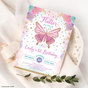 May include: A pink and gold butterfly with glitter accents on a white background. The text "Flutter On Over" is above the butterfly. The text "For Emily's 1st Birthday" is below the butterfly. The text "Saturday October 30 12PM-2PM" is below the birthday text. The text "Emily's House 123 Butterfly Kisses Rd. Sydney 2345 RSVP Emma 0412 345 567 By 10th October" is below the date and time.