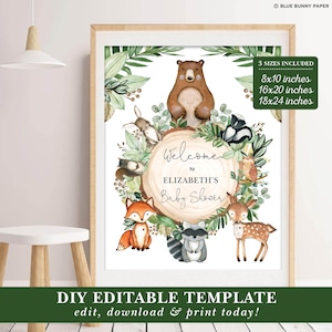 May include: Printable baby shower welcome sign featuring a woodland theme with a brown bear, fox, raccoon, deer, and owl surrounded by greenery. The sign says "Welcome to Elizabeth's Baby Shower".
