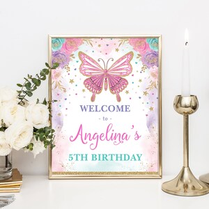 May include: A welcome sign for a 5th birthday party with a pink butterfly, gold glitter, and floral accents. The sign says "Welcome to Angelina's 5th Birthday".