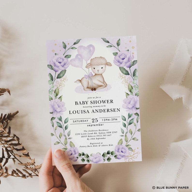 May include: A baby shower invitation with a purple and green floral design. The invitation features a cute cartoon lamb holding balloons. The text on the invitation reads "Join us for a Baby Shower honouring mummy-to-be Louisa Andersen, Saturday, September 25, 12PM-2PM".