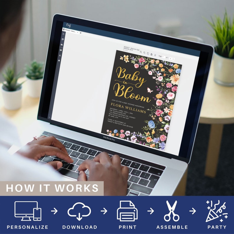 May include: A laptop screen displaying a printable baby shower invitation with a floral design and the text "Baby in Bloom" and "Flora Williams". The invitation is on a black background with gold text. The image shows a person using the laptop to personalize the invitation.