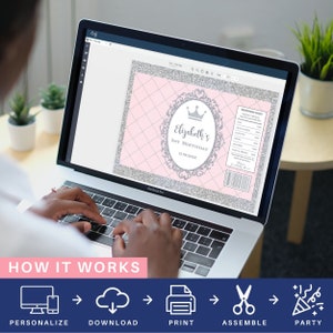May include: A computer screen displaying a printable design for a snack bag. The design features a pink and silver glitter background with a silver crown and the text "Elizabeth's 1st Birthday 12.08.20XX".
