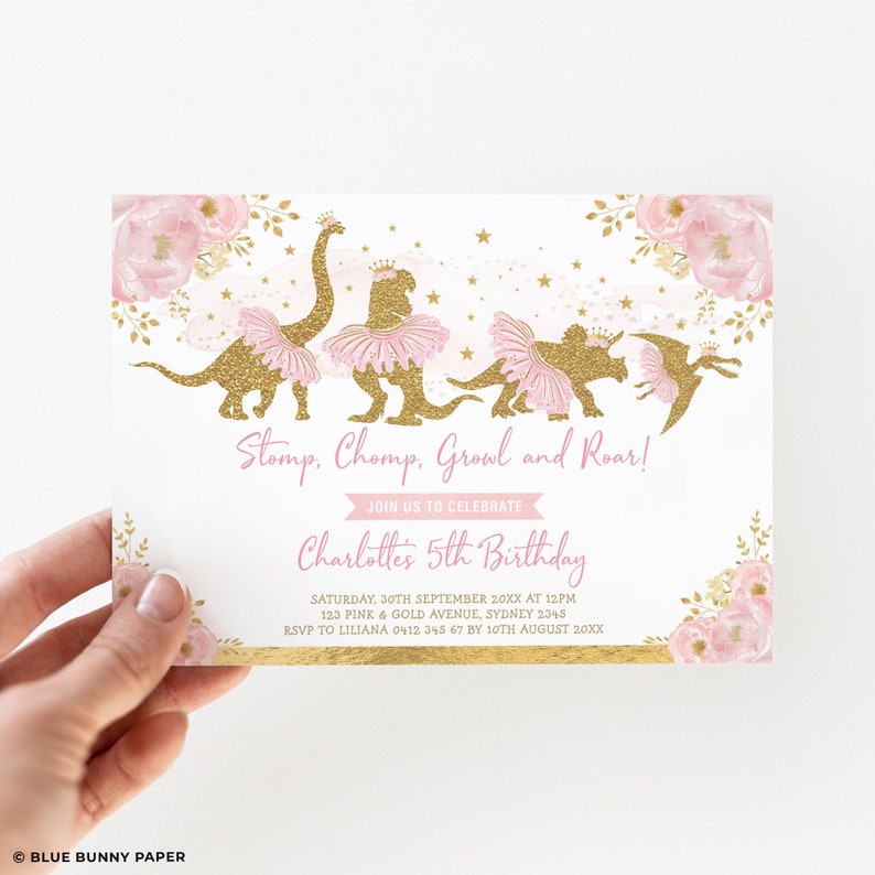 May include: A birthday invitation with a pink and gold theme. It features glittery dinosaur silhouettes in tutus, with the text "Stomp, Chomp, Growl and Roar!". The invitation includes details for Charlotte's 5th birthday, including the date, time, and location.
