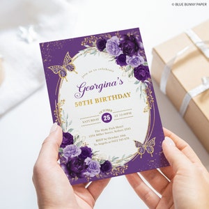 An invitation card held with two hands.