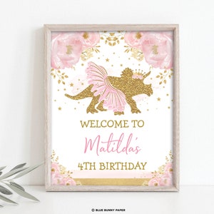 May include: A printable sign for a 4th birthday party featuring a pink and gold glitter dinosaur wearing a tutu. The sign says "Welcome to Matilda's 4th Birthday".