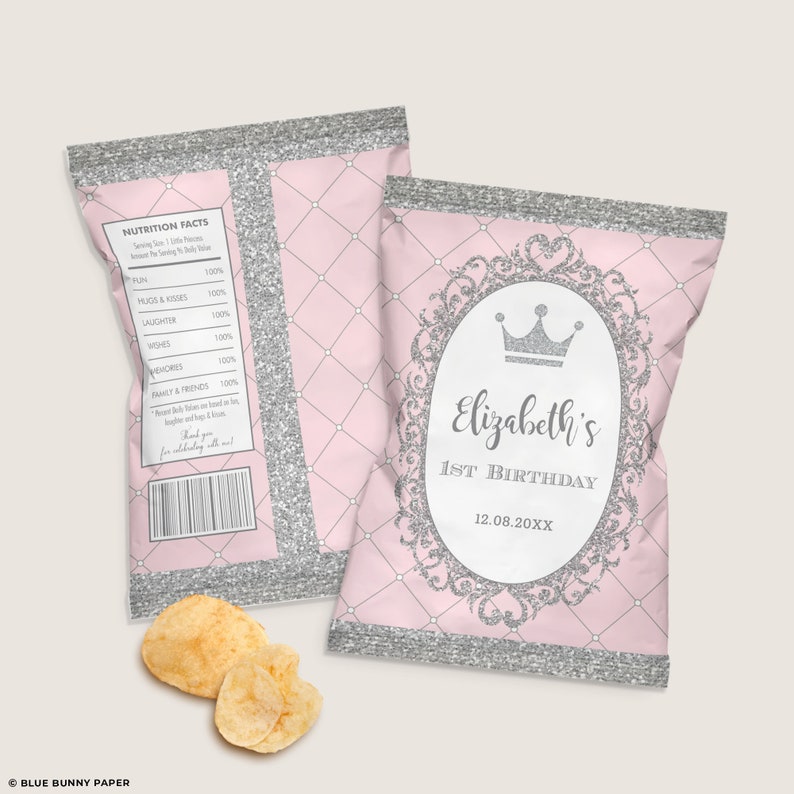 May include: Pink and silver glitter chip bag with a silver crown and the text "Elizabeth's 1st Birthday 12.08.20XX".