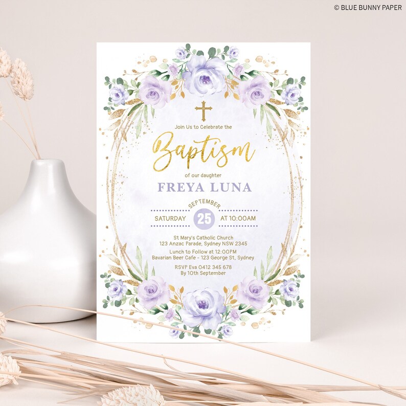 May include: A baptism invitation with a gold and white floral design. The invitation features a cross, the words "Baptism" and "FREYA LUNA", and the date "SEPTEMBER 25".