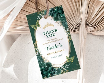 May include: Green and gold thank you tag with a butterfly and floral design. The text reads "Thank You for coming and celebrating with us! Carla's Quinceañera 15.03.2031"