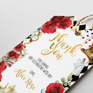 May include: White thank you tag with gold lettering that says "Thank You" and "For Coming and Celebrating with Me! Love, Alice Rose". The tag is decorated with red roses, playing cards, a pocket watch, and a Mad Hatter hat.