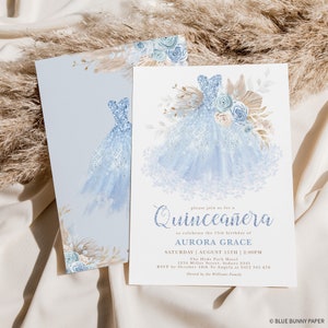 May include: A blue and white Quincea&ntilde;era invitation with a watercolor illustration of a blue ball gown with floral accents. The text reads "Please join us for a Quincea&ntilde;era to celebrate the 15th birthday of Aurora Grace. Saturday, August 15th, 2:00 PM. The Hyde Park Hotel, 1234 Miller Street, Sydney 2345. RSVP by October 10th to Angela at 0412 345 678. Hosted by the Williams Family."
