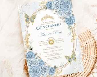 May include: A rectangular Quinceañera invitation card featuring blue watercolor roses, gold butterfly illustrations, and a gold crown icon. The text includes the name Aurora Rose, the date October 25, and event details for St Peter Julian Church.