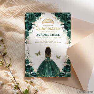 May include: A Quincea&ntilde;era invitation with a green and gold floral design. The invitation features a silhouette of a young woman in a green dress with a crown on her head. The text on the invitation reads "Please join us for a Quincea&ntilde;era to celebrate the 15th birthday of Aurora Grace. Saturday, August 15th, 2:00 PM. The Hyde Park Hotel, 1234 Miller Street, Sydney 2545. RSVP by October 10th to Angela at 0412 345 678. Hosted by the Williams Family."