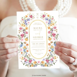 May include: A floral wedding invitation with a gold border and text that reads "Please join us for the wedding of Maura Rose Williams and George Carter Whitfield, 08.05.2024 at 4 o'clock in the afternoon, Domaine de la Rose, Sydney, NSW, dinner and dancing to follow."