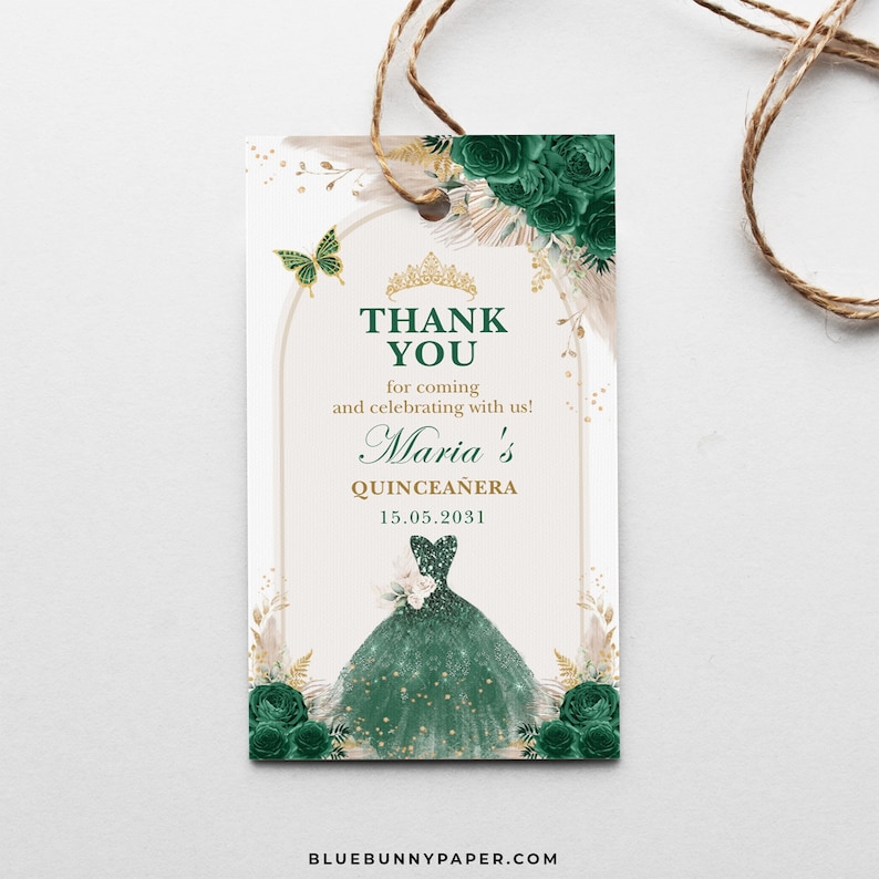 May include: A thank you tag for a Quincea&ntilde;era celebration. The tag features a green dress illustration, gold accents, and the text "Thank You" with the name "Maria's" and the date "15.05.2031". A butterfly and floral elements complete the design.