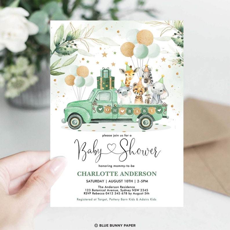 May include: A green and gold baby shower invitation with a cartoon truck carrying a giraffe, zebra, lion, elephant, and hippo. The truck is decorated with balloons, stars, and a banner that says "Oh Baby". The invitation includes the text "Please join us for a Baby Shower honoring mommy-to-be Charlotte Anderson, Saturday, August 10th, 2-5pm, The Anderson Residence, 123 Botanical Avenue, Sydney NSW 2345, RSVP Rebecca 0412 345 678 by August 5th, Registered at Target, Pottery Barn Kids & Adairs Kids".