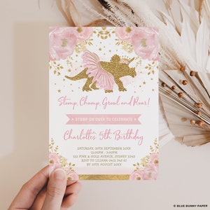 May include: Pink and gold birthday invitation with a gold glitter dinosaur wearing a pink tutu and a crown. The text reads "Stomp, Chomp, Growl and Roar! Charlotte's 5th Birthday".