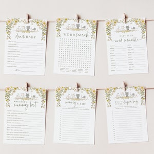 Op de afbeelding: Een set van zes printbare babyshower-spelkaarten met een bloemen- en kattenmotief. De kaarten bevatten spellen zoals "Lieve baby", "Woordzoeker", "Babyartikel-woordensalade", "Wie kent mama het beste", "Geheugenspel" en "Wat zit er in de luiertas".
