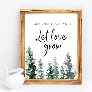 Puede incluir: Un cartel imprimible con un fondo de acuarela de árboles verdes y azules. El texto en el cartel dice "Lleva uno a casa y deja que el amor crezca."